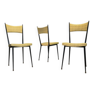 Three vintage chairs in the style of Colette Gueden.
