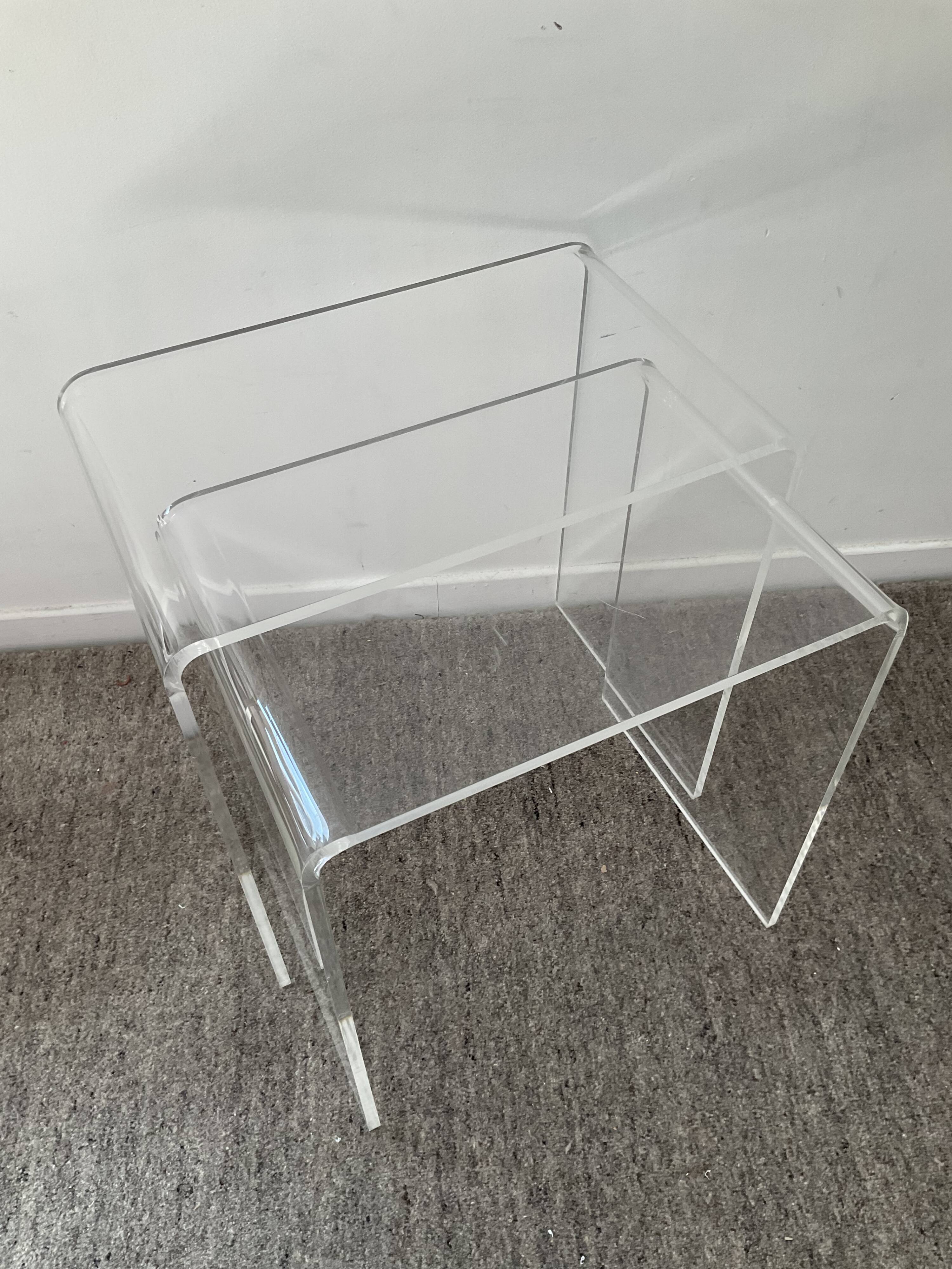 Duo of pull-out tables in plexiglass 70s