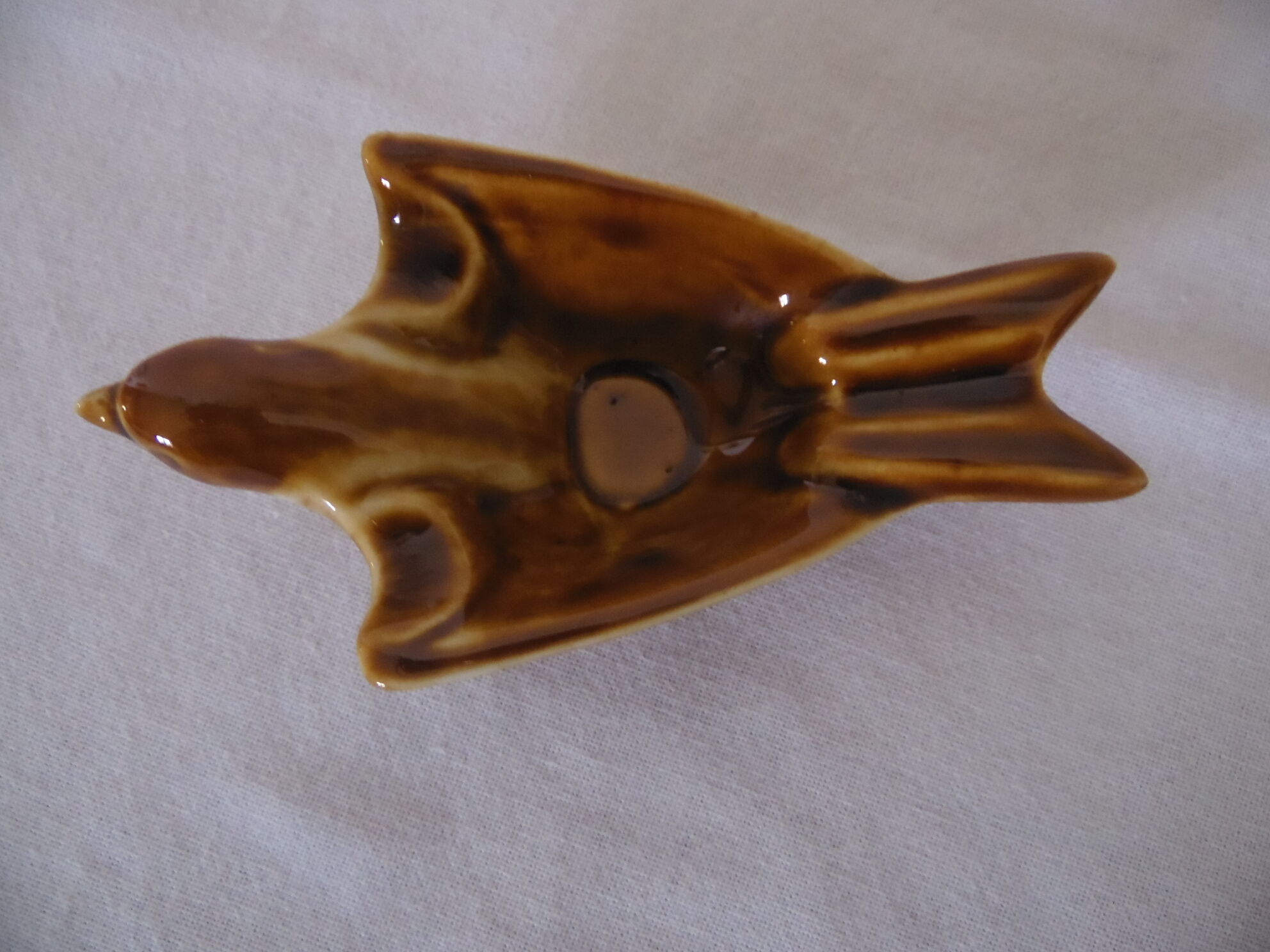 Empty pocket or ashtray model bird