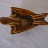 Empty pocket or ashtray model bird