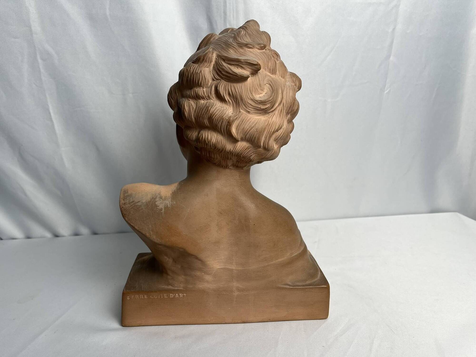 Cipriani, child bust in terracotta art signed 20th century