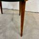 Vintage Baumann chair from the 1950s - curved wood and green seat.