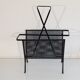 Magazine holder by Mathieu Mategot