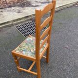 4 solid wood chairs with embroidered fabric