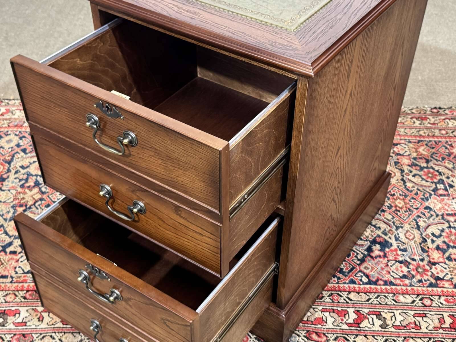 Office cabinet in oak with English leather top from the 1990s.