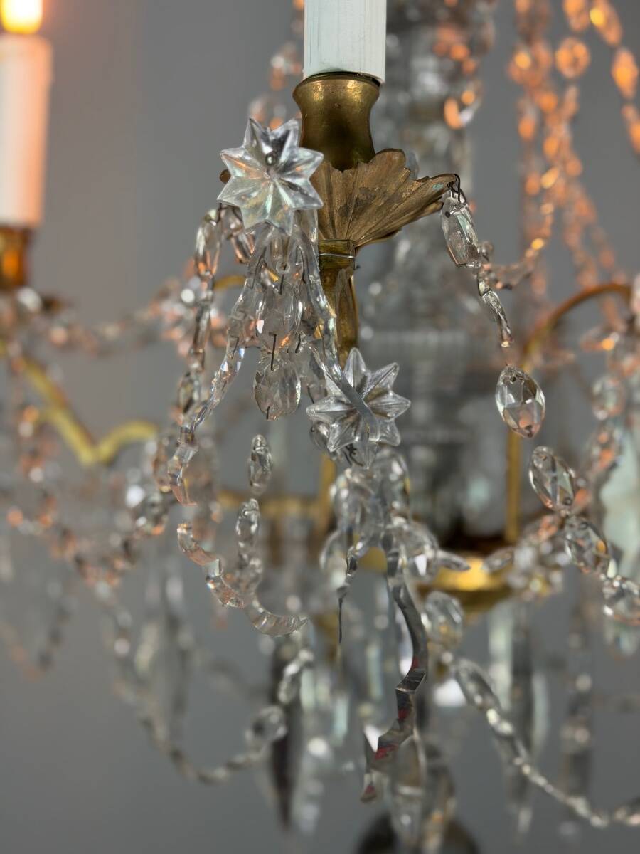 Bronze chandelier with cut crystal pendants, circa 1800.