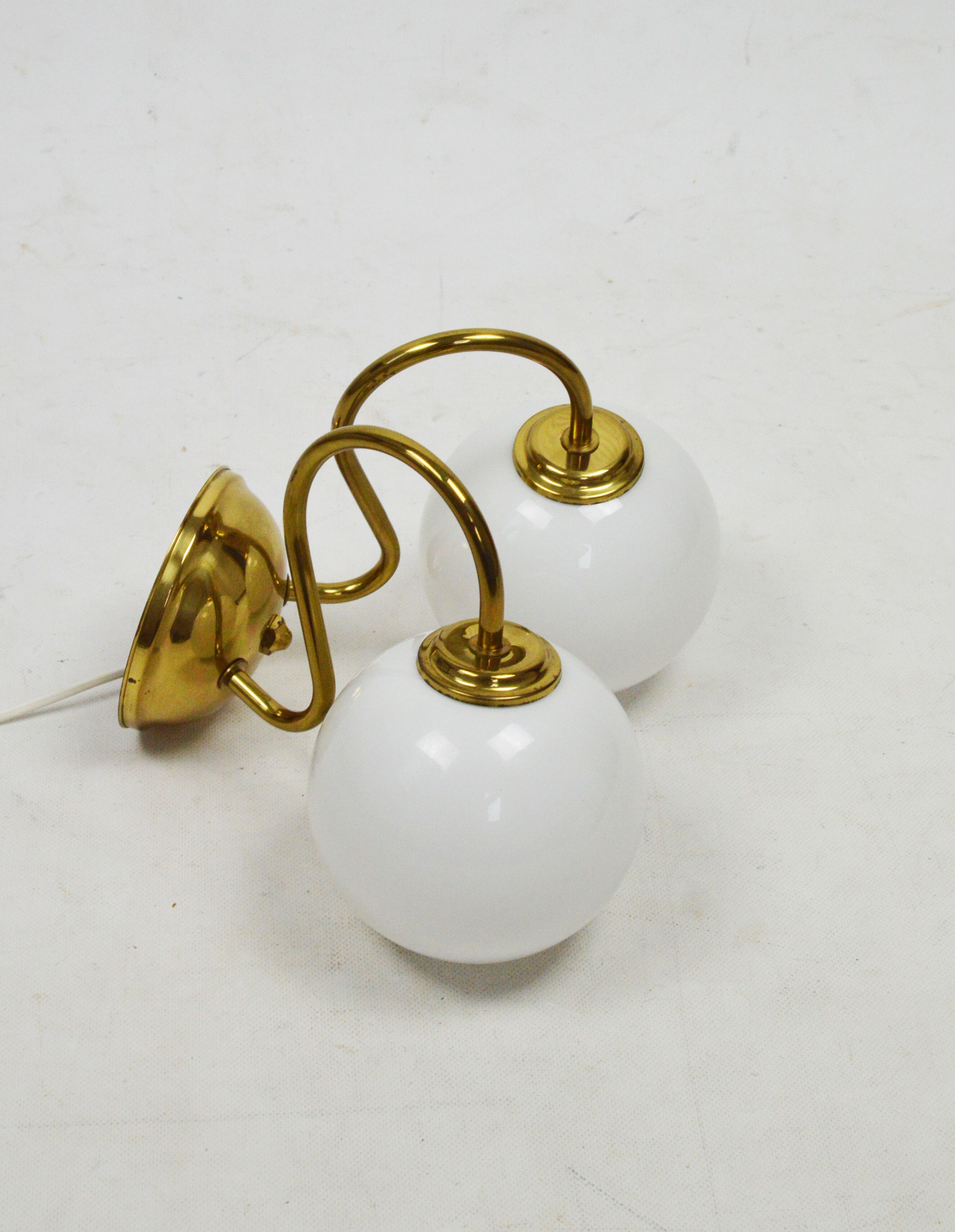 A pair of wall lamps, Poland, 1980s