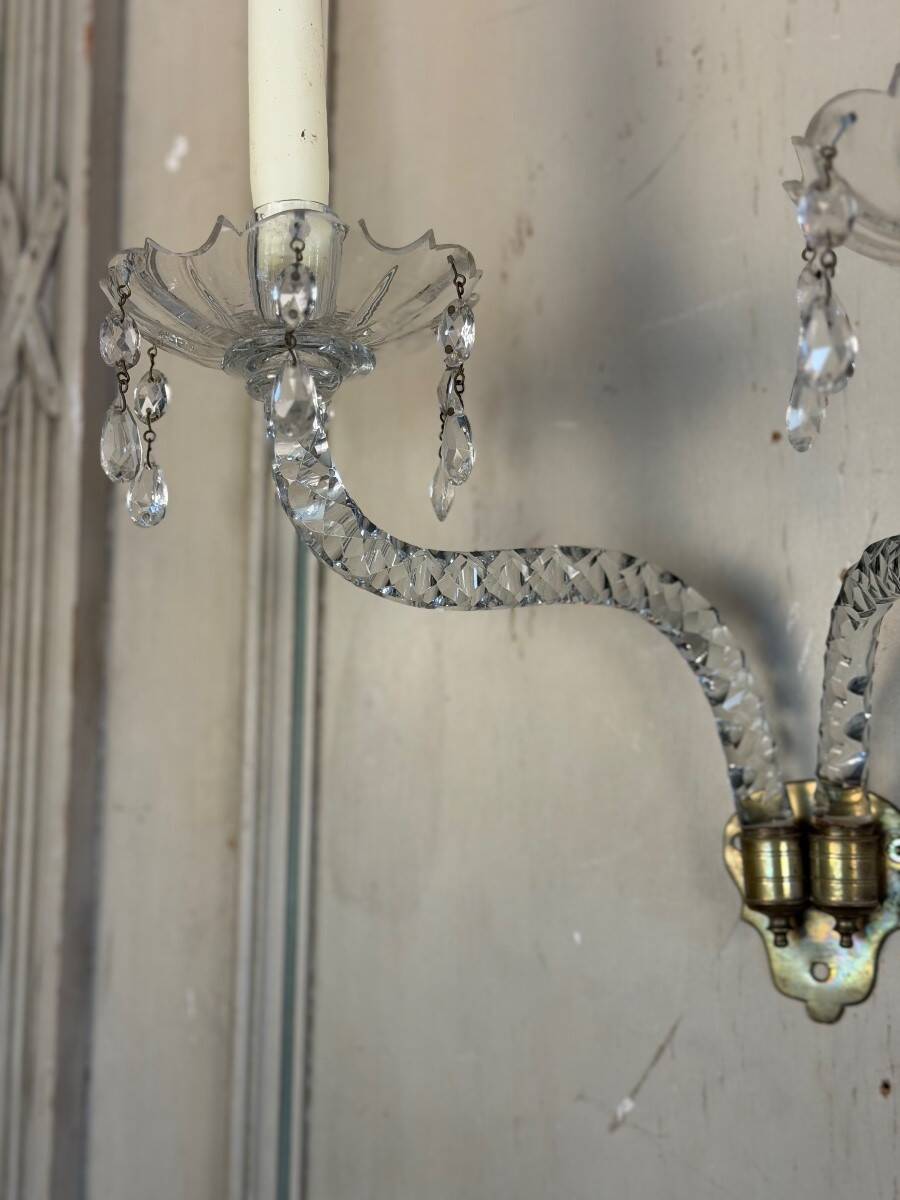 Pair of cut crystal wall sconces in the style of Maydwell and Windle, England, 18th century.