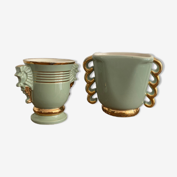 Two green and gold vases with handles