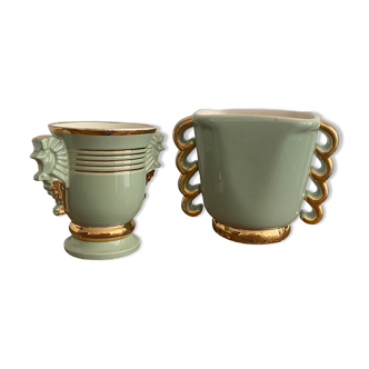 Two green and gold vases with handles