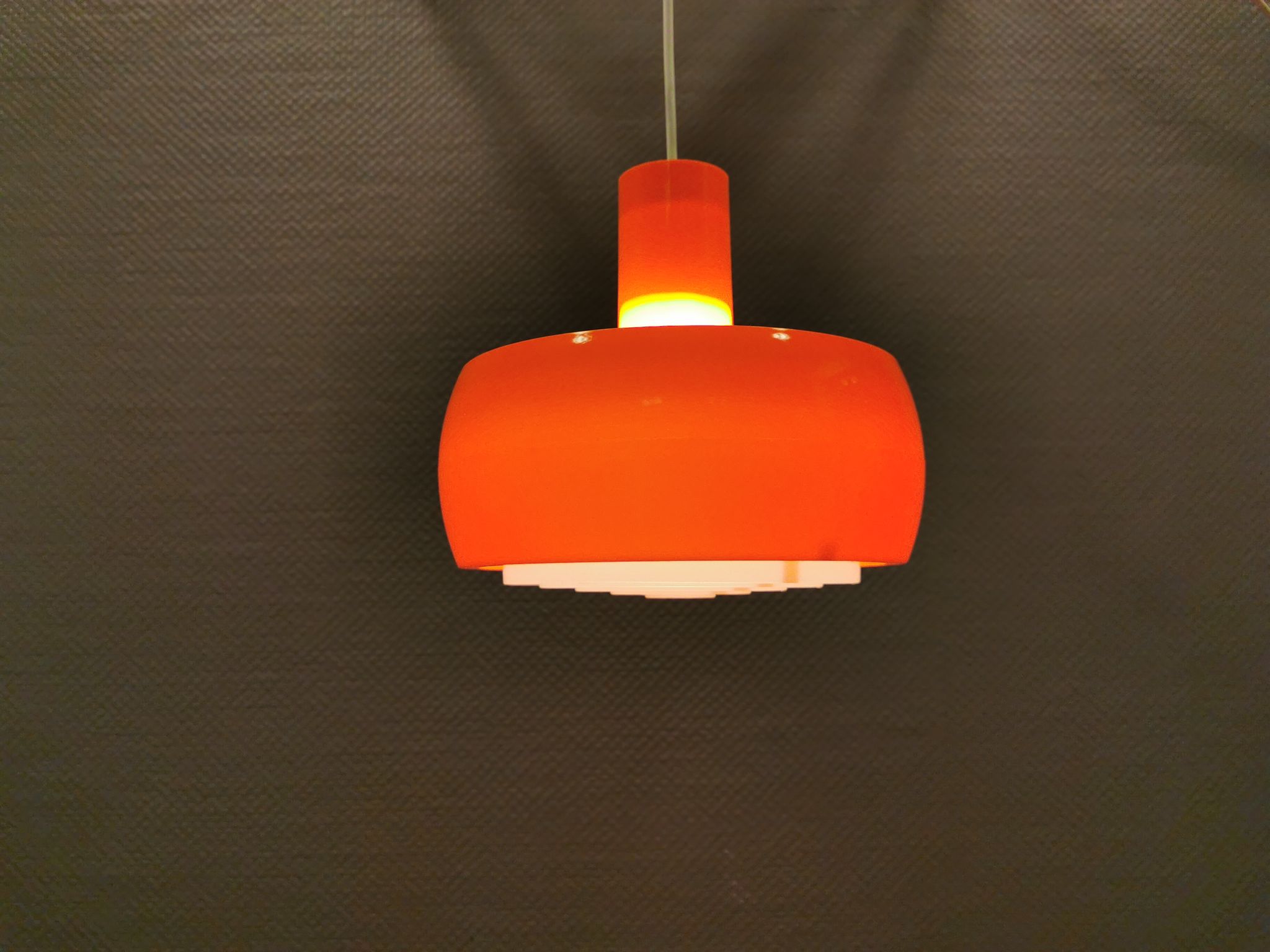 Hanging lamp, designed by Bent Karlby for Schrøder Kemi Denmark 1970s. Made of orange ABS plastic