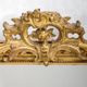 Louis-Philippe mirror from the 19th century with a ribbon trompe-l'œil frame.