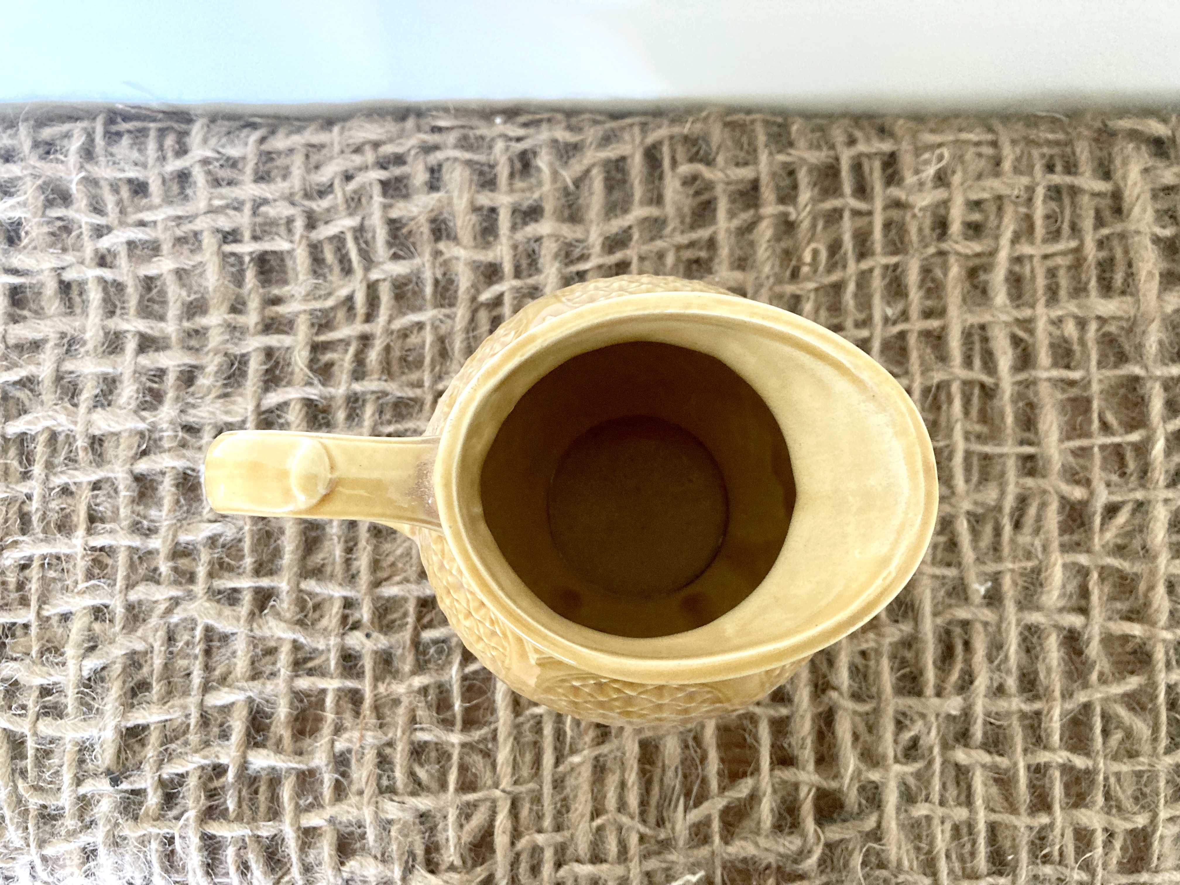 Mustard yellow ceralic pitcher