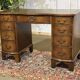 English desk from the 1950s in mahogany with a leather top.