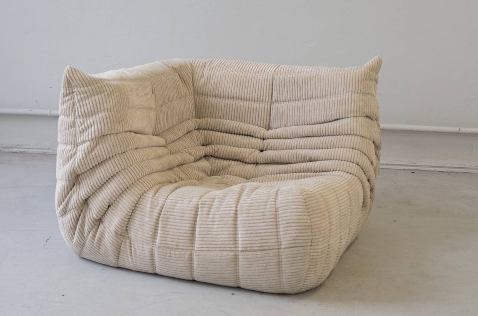 Togo sofa set in beige corduroy, model designed by Michel Ducaroy 1973