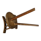Old farmers tripod chair for decorative use