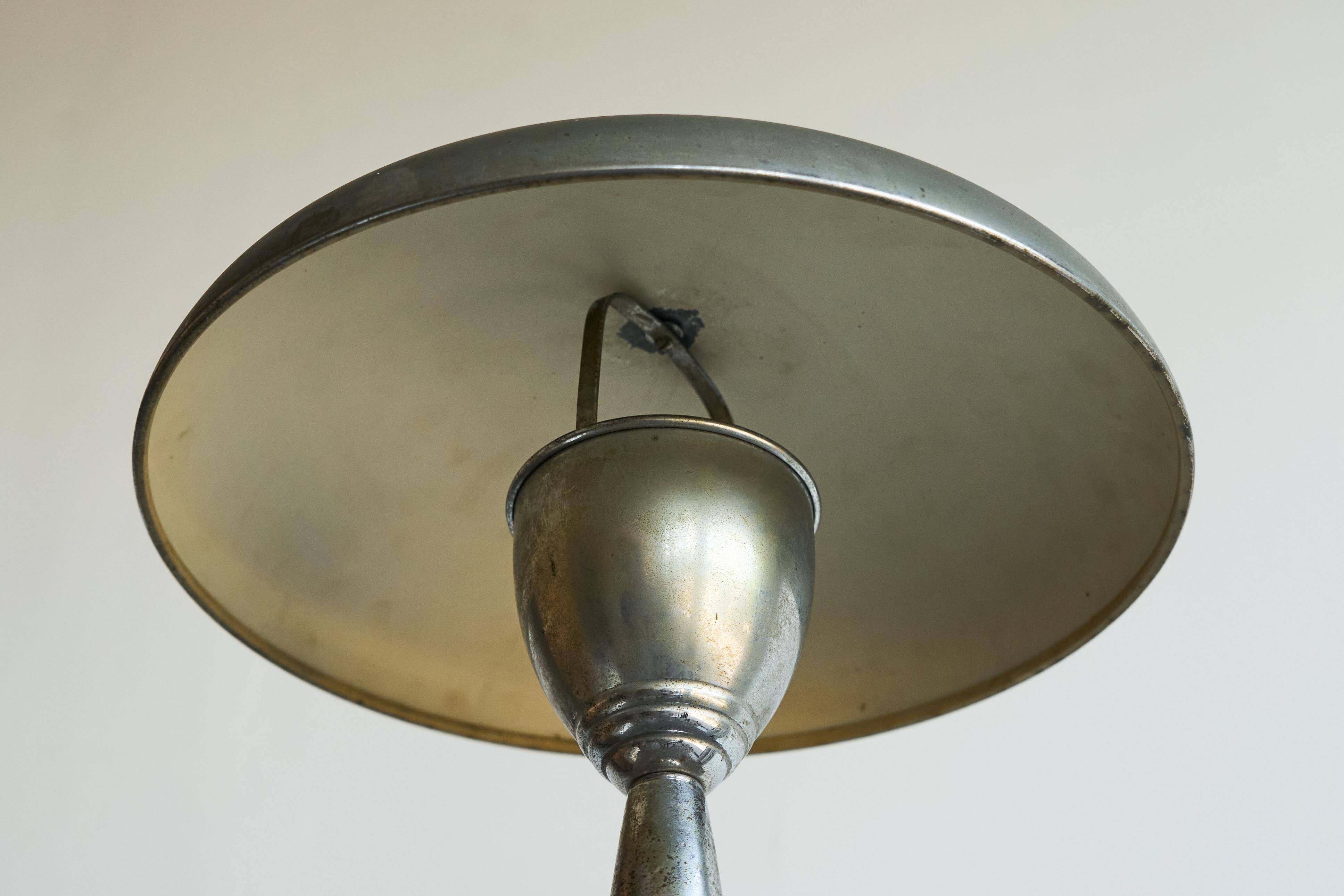 Patinated brass and chrome table lamp from the 1950s.