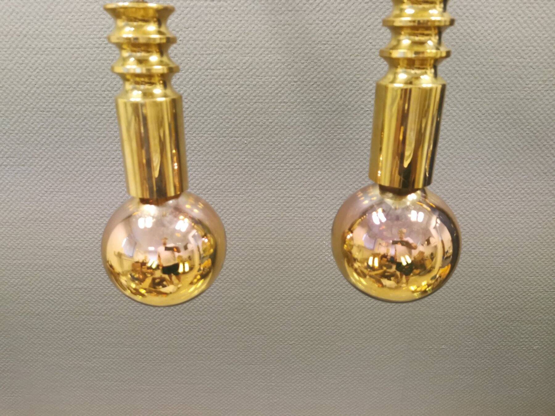 Frimann Goldstar pendant lights made by Philips in the 1970s. Model SPYBALL