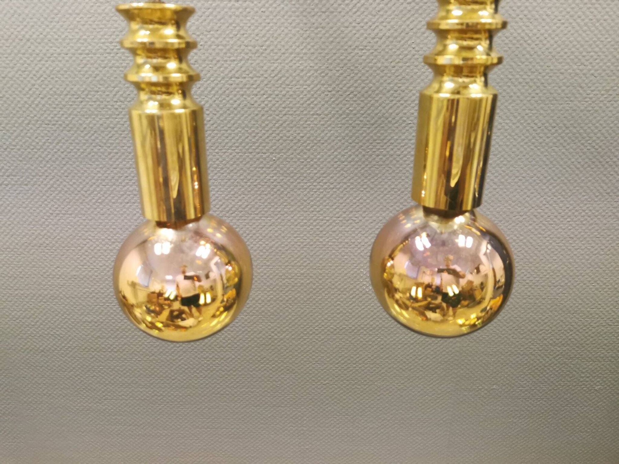 Frimann Goldstar pendant lights made by Philips in the 1970s. Model SPYBALL
