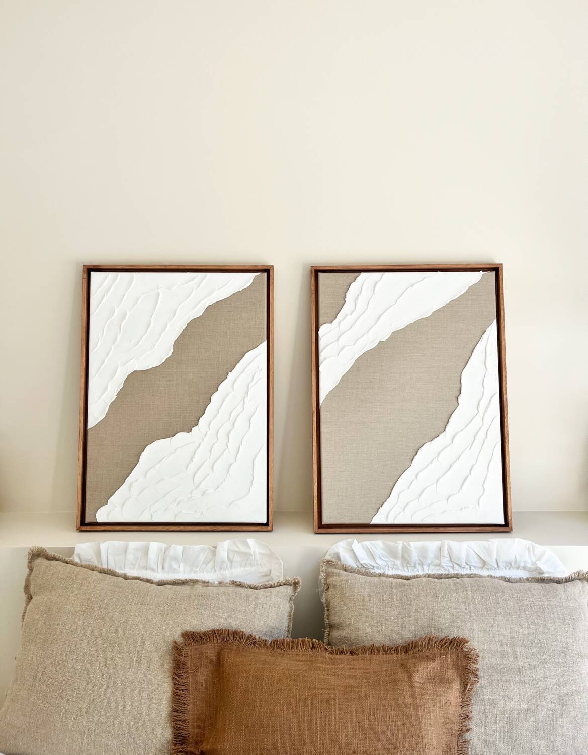 Diptych relief panels in linen and white.