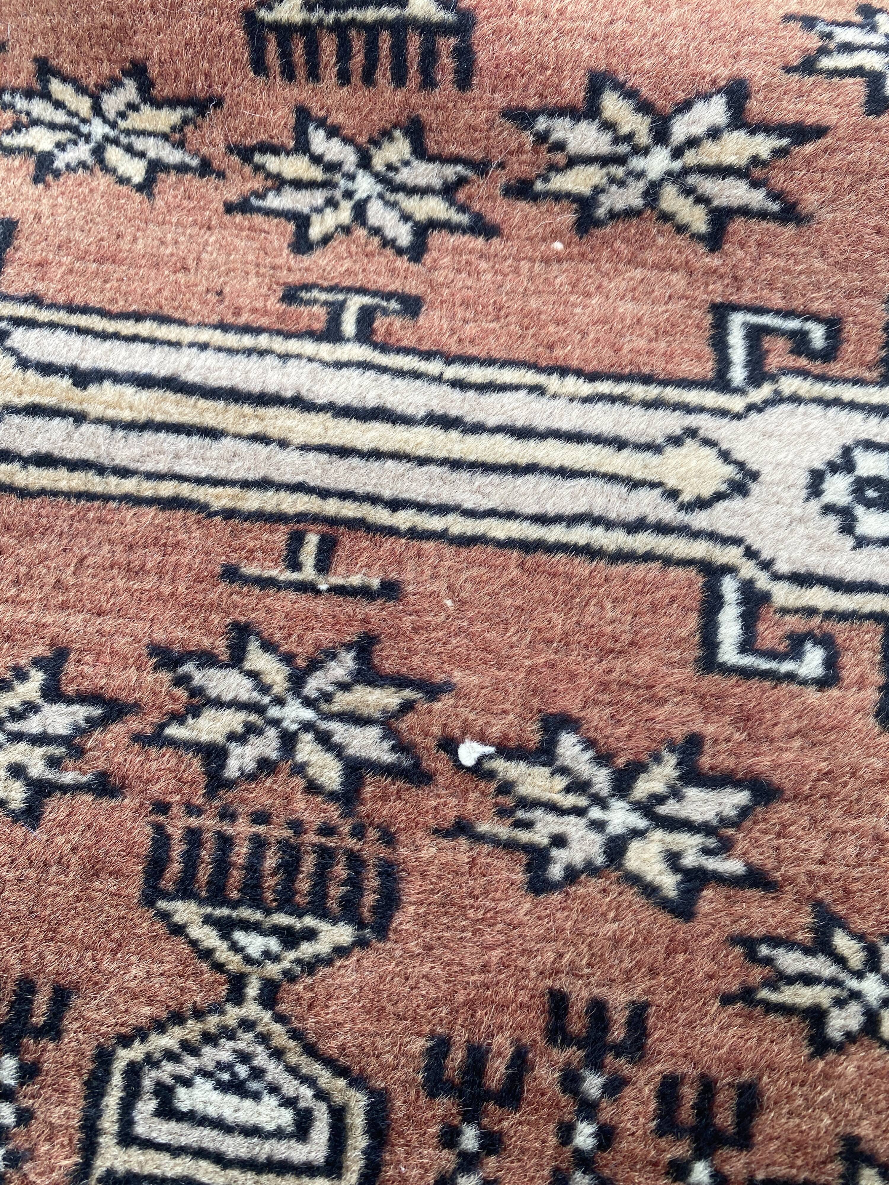 Vintage hand knotted rug with geometric patterns on a grey/beige/terracotta background 170 x 96 cm