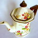 Coffee maker in earthenware decorated with hawthorn flowers, from the house Villeroy--Boch, model "Portobello"