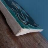 Art Nouveau trivet, glazed ceramic, signed
