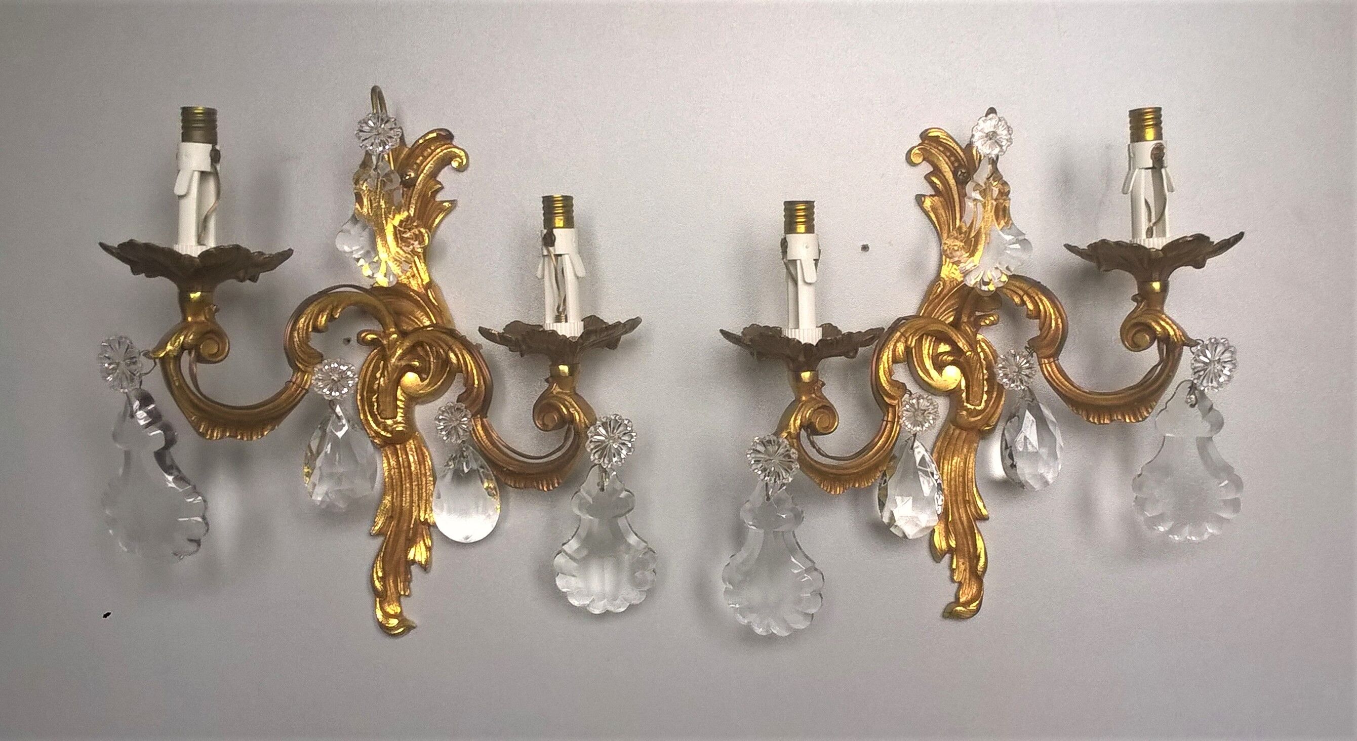 Pair of asymmetrical appliques, gilded bronze and crystal tassels, Louis XV style