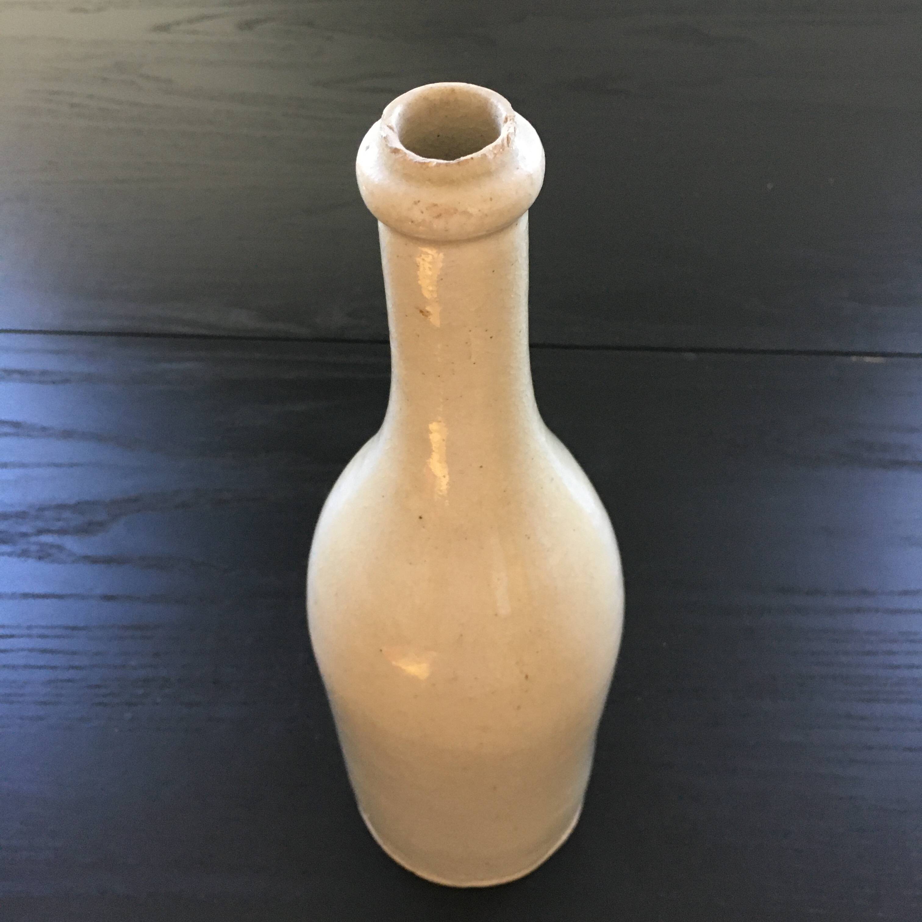 Beige stoneware bottle