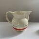 Red, white and silver porcelain jug set by Edmond Bellefroid for Robo.