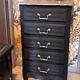 Chiffonier en bois peint coloris noir et gris France 1950 avec 5 tiroirs