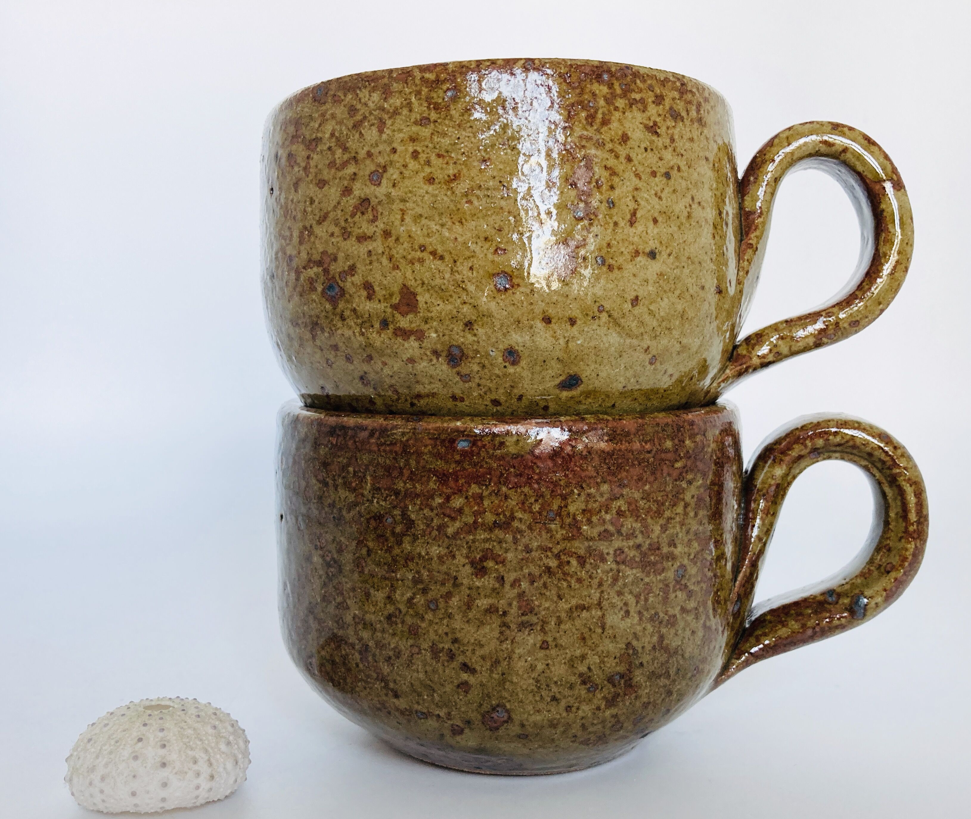 Pair of mugs in sandstone