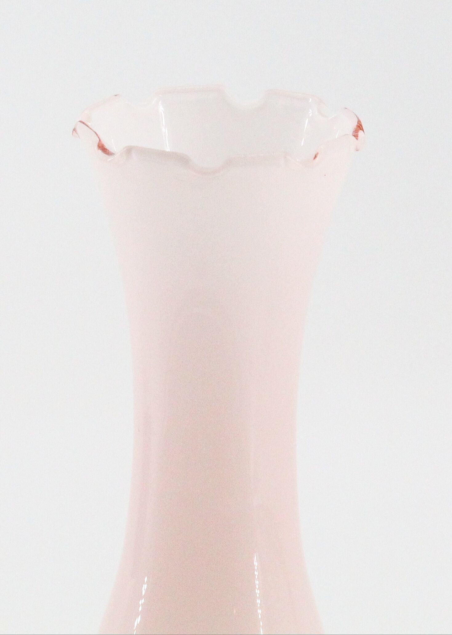 Old vase in pink opaline