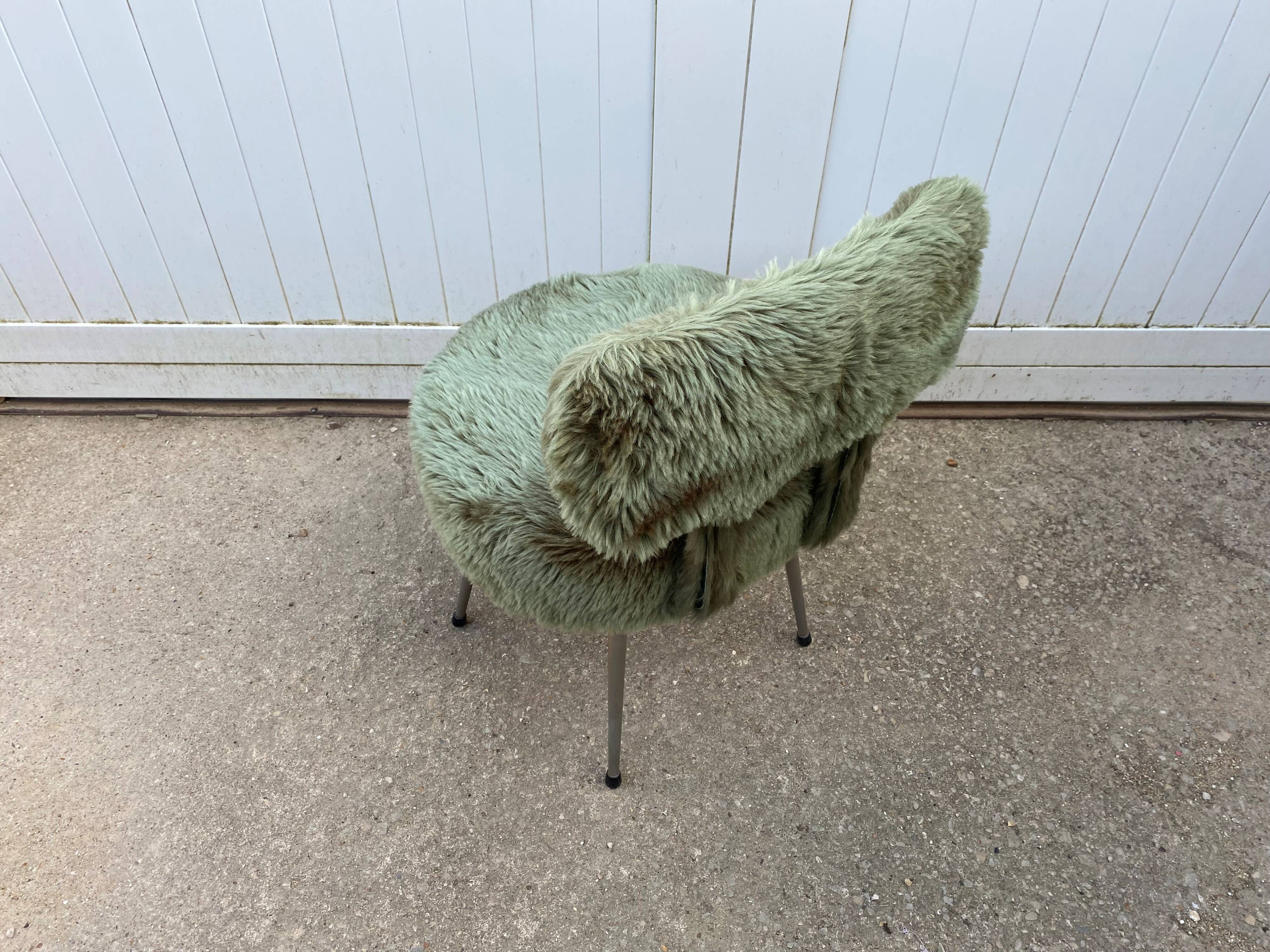 Vintage green furry chair from the 1960s