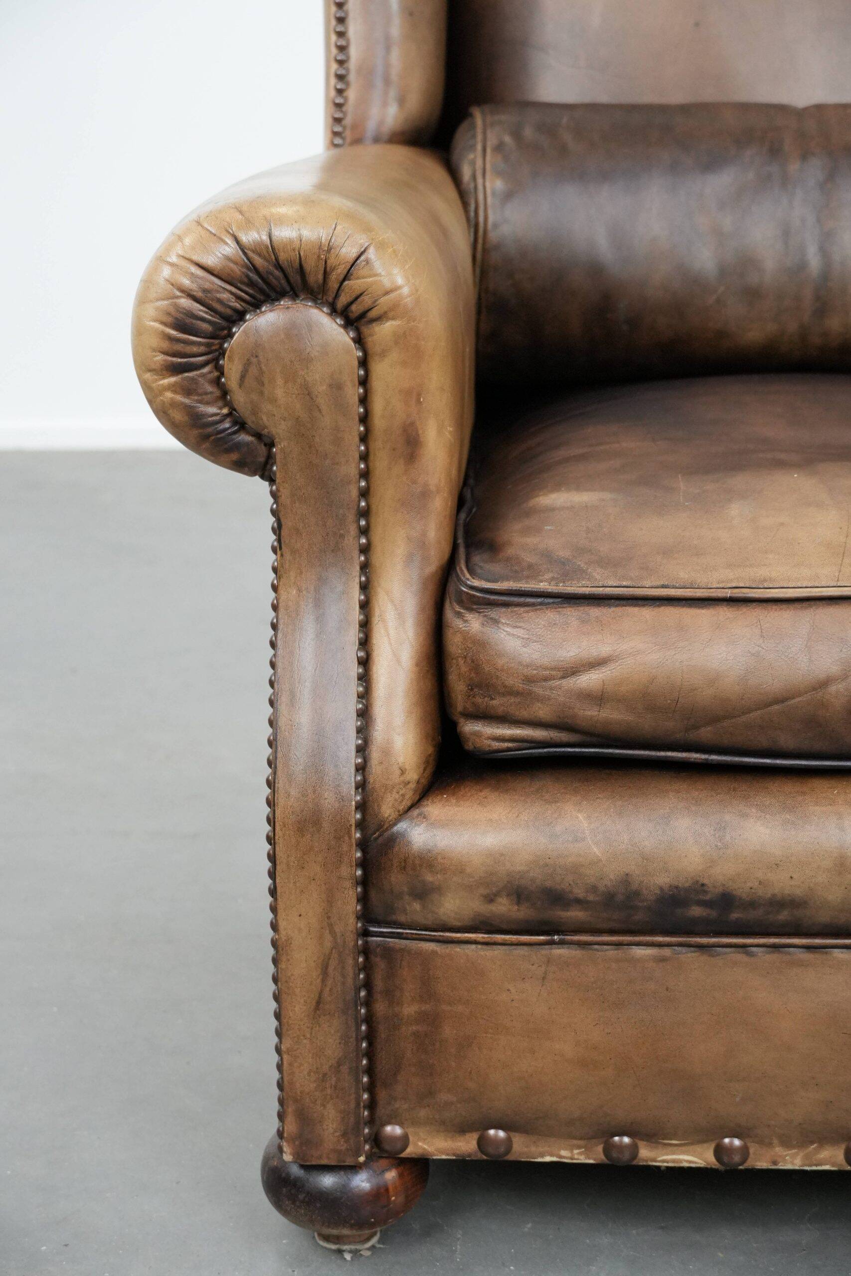 Luxury and large cowhide leather wingback chair in English style