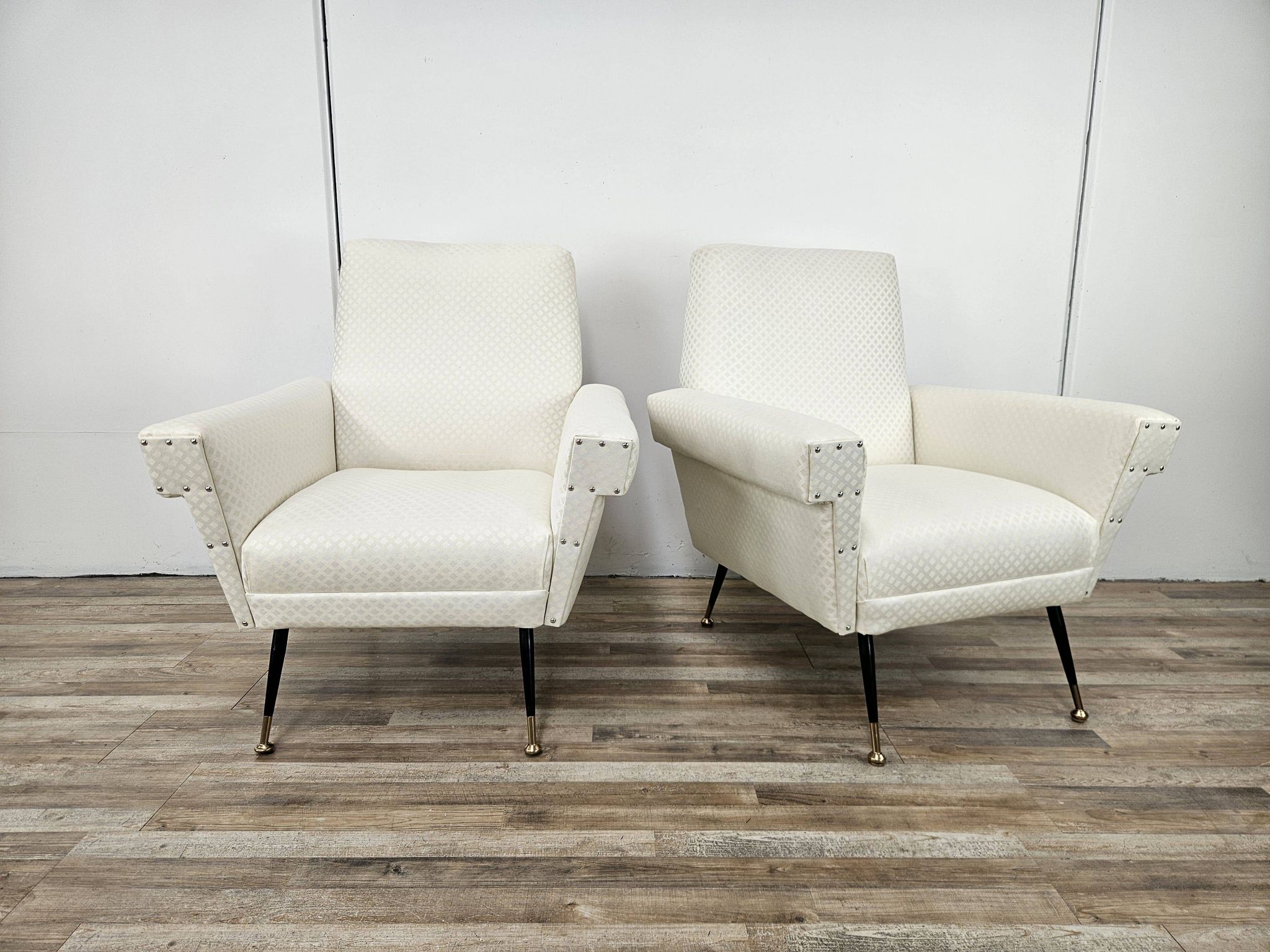 Italian armchairs from the 1950s in cream fabric with iron legs.