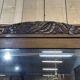 Art deco period beveled mirror in oak