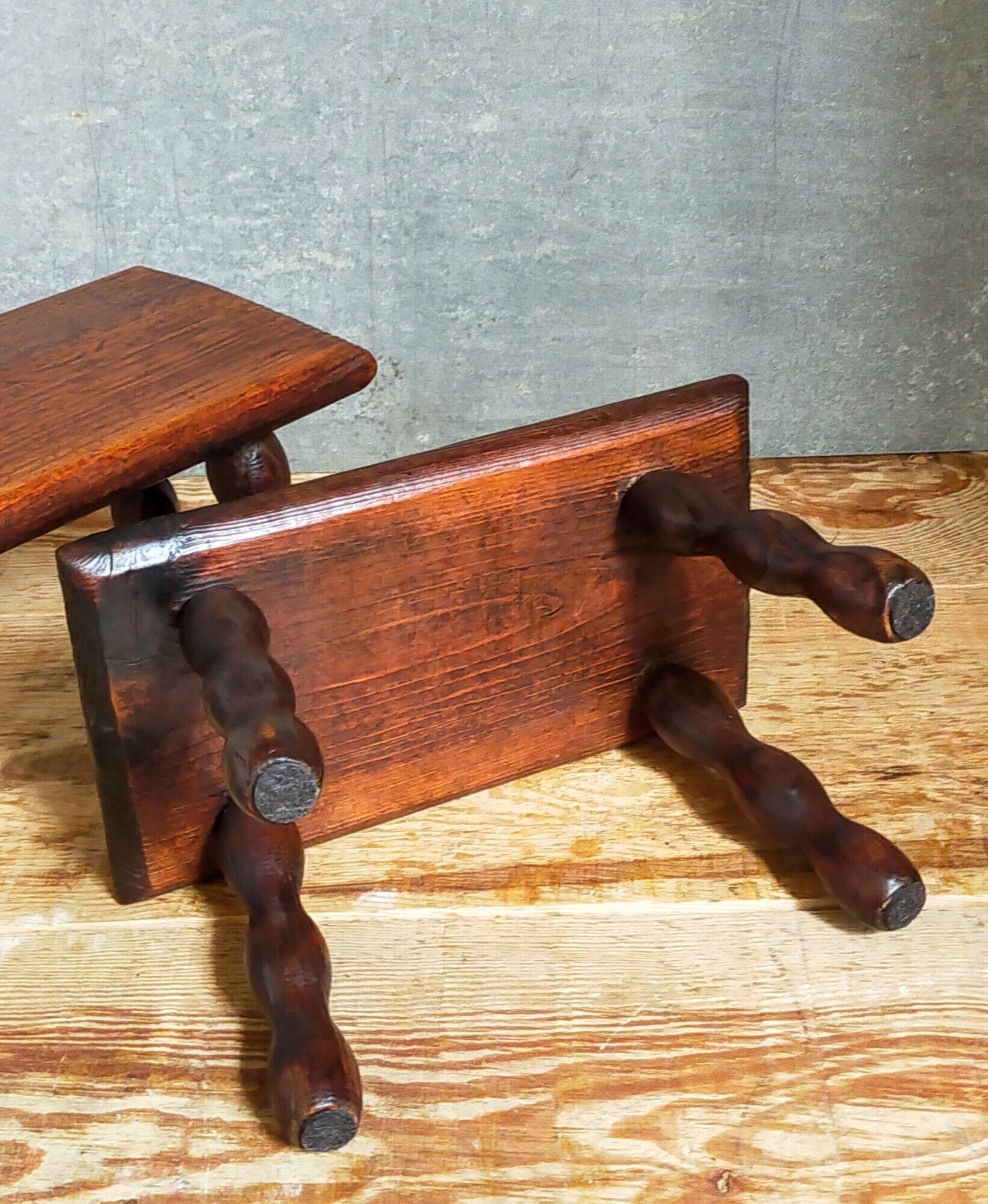Pair of vintage solid turned wood footstools