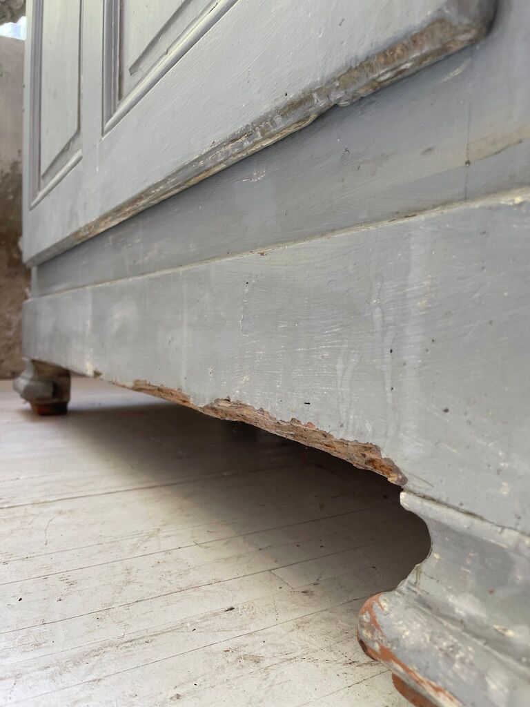 Blue patinated cap cabinet