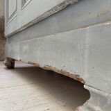 Blue patinated cap cabinet