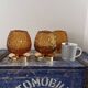 Set of three vintage wall or ceiling lights in amber chiseled glass