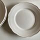 Set de 4 assiettes de Mougins en terre émaillée blanche à godrons