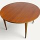 Round extendable dining table in teak – 1960s
