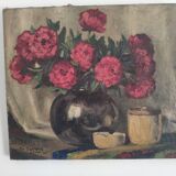 Still life with bouquet of red flowers