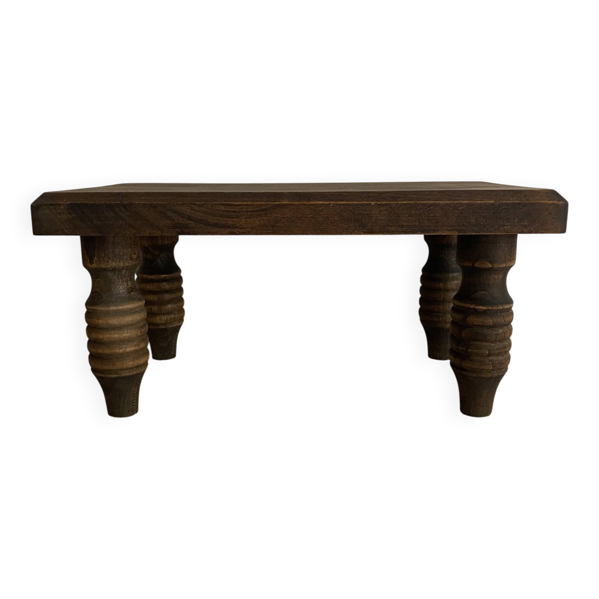 Low stool, turned wooden legs.