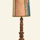 Renaissance table lamp in polychrome carved wood with cherubs.