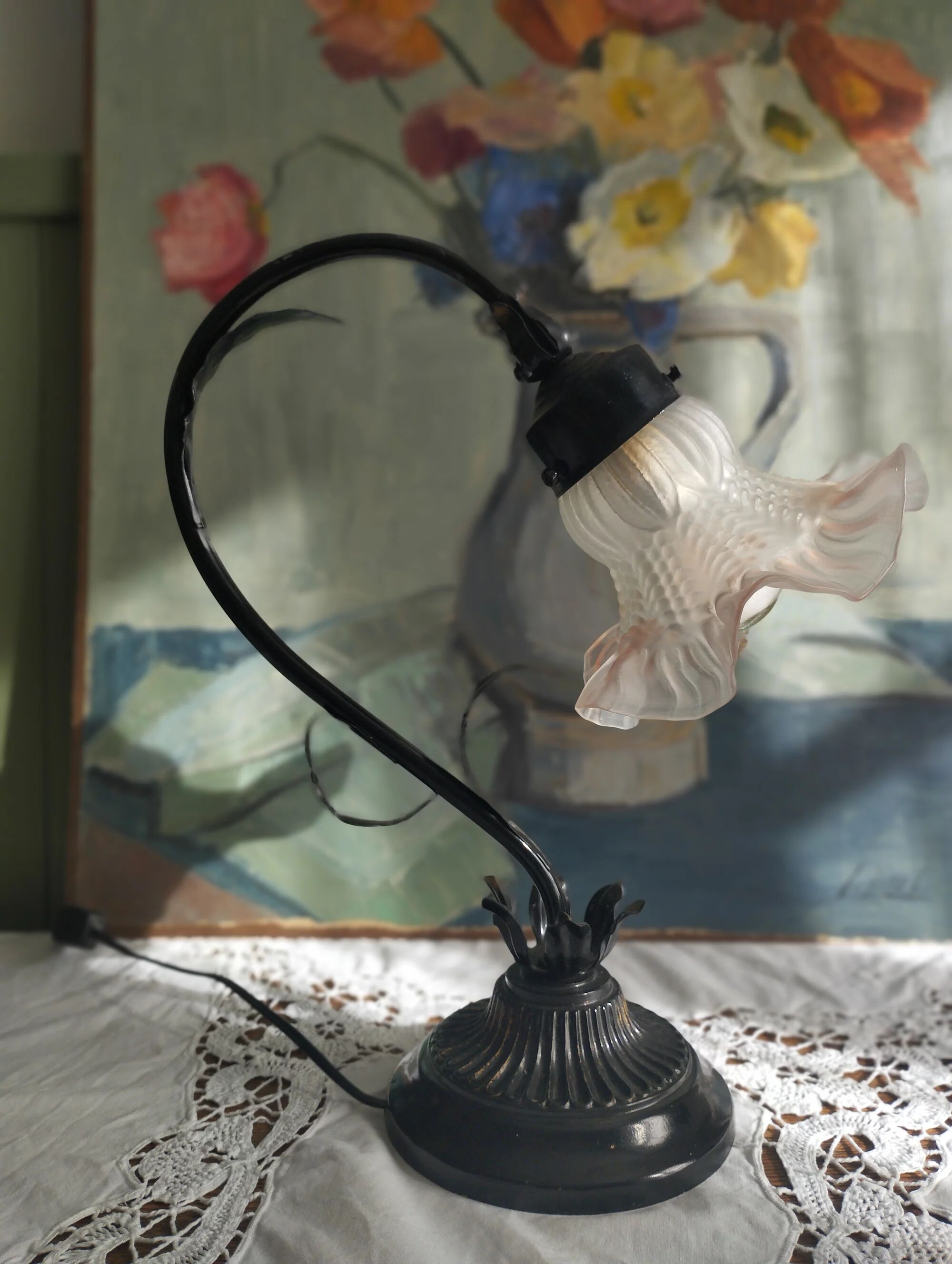 Tulip lamp in patinated black metal with an opaque glass shade.