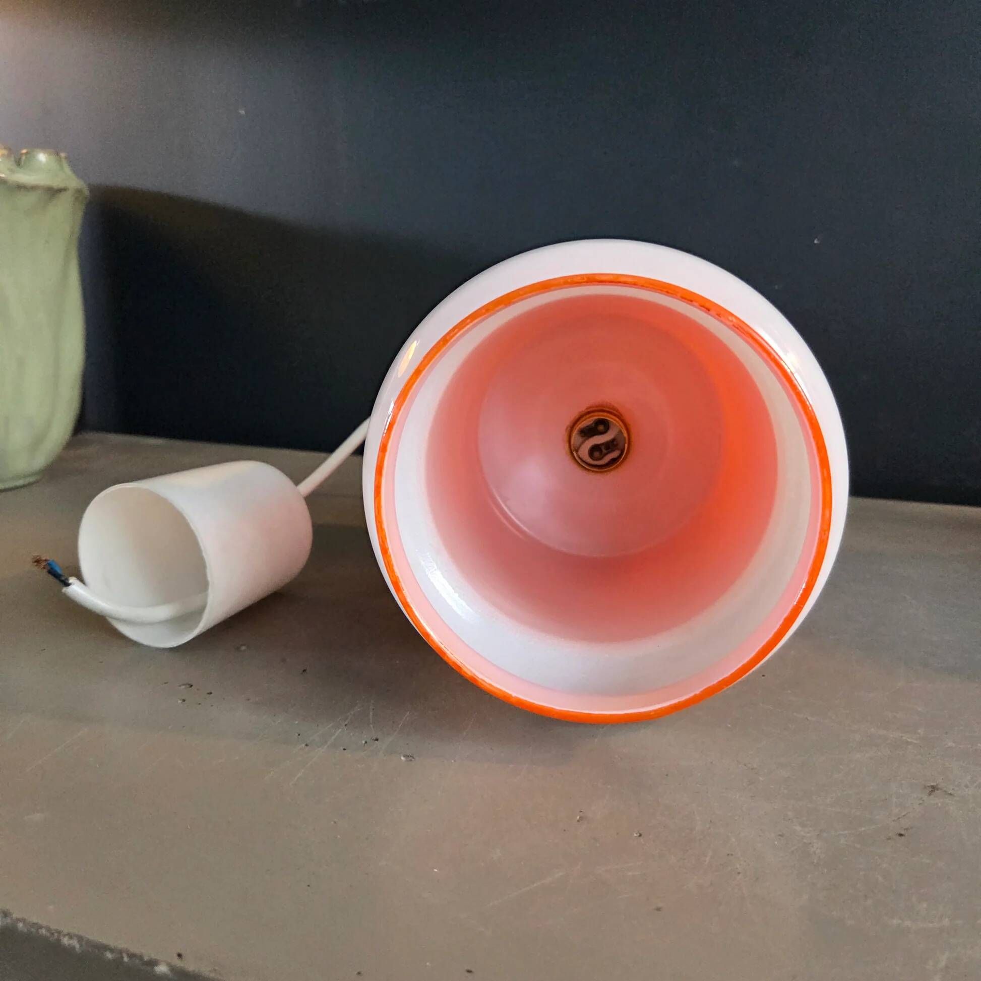 Vintage suspension in orange and white glass.