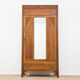 Art Deco wardrobe in carved wood with mirror from the 1930s.