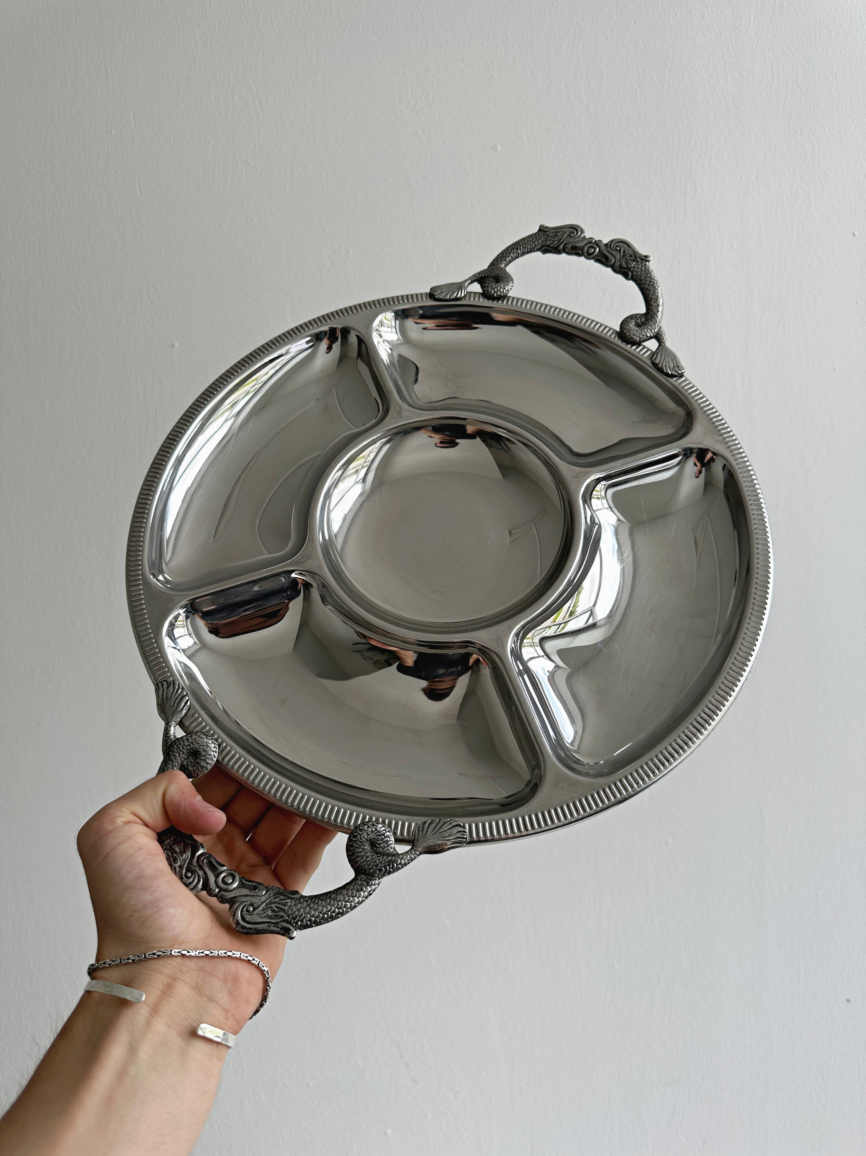 Vintage silver-plated metal serving tray with compartments.